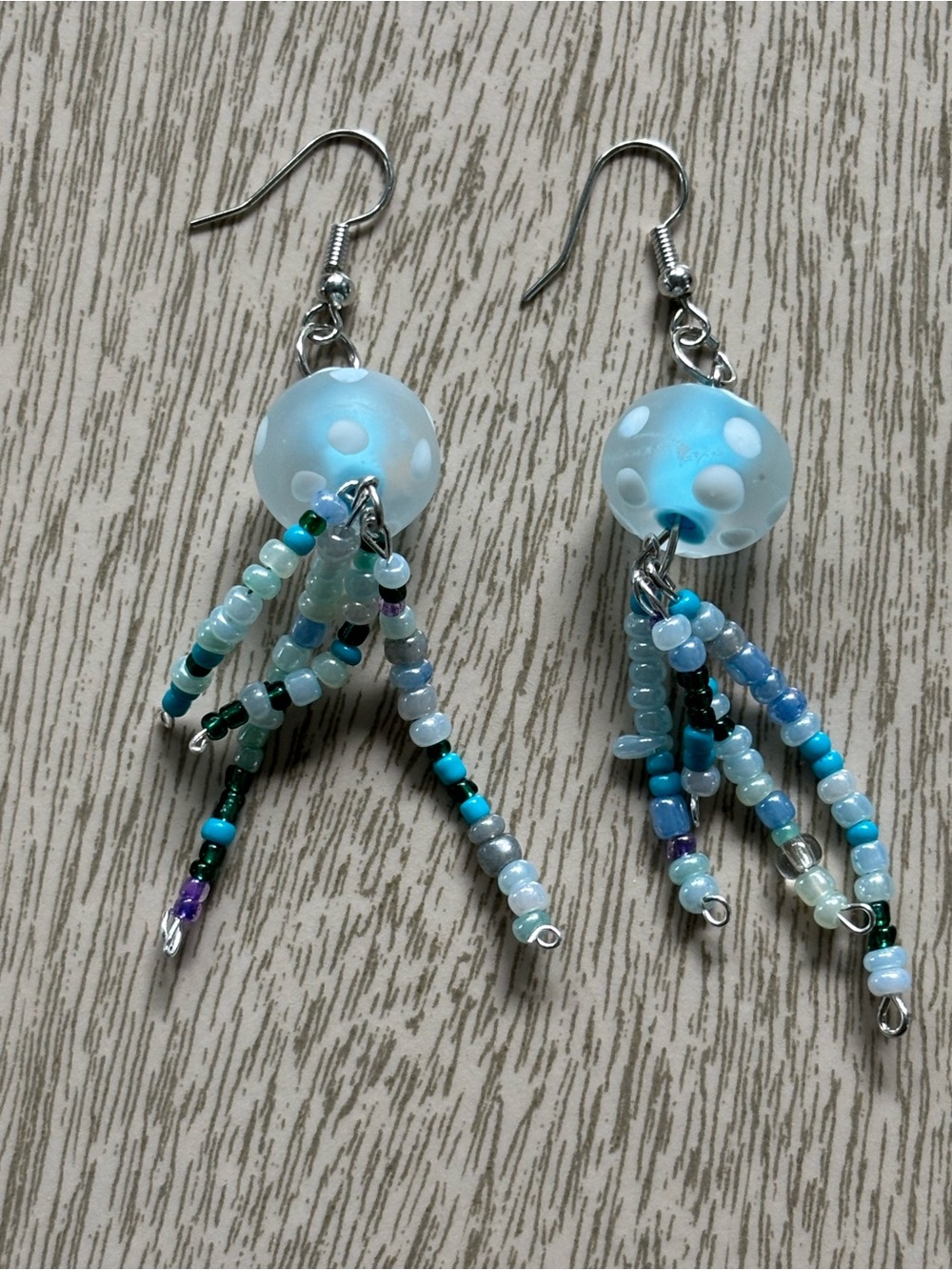 Hand Crafted Light Blue Polka Dot Bead Tassel Earrings